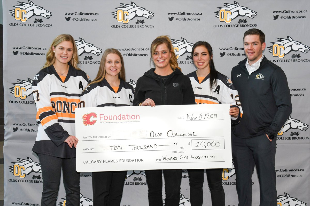 On behalf of the Calgary Flames Foundation I was fortunate to deliver the good news -  $10,000 scholarship to the Olds College Broncos Women's Hockey Team.  Jesse Jack AC, Kali Cummings C, Fiona Milligan AC, Coach Chris Leeming