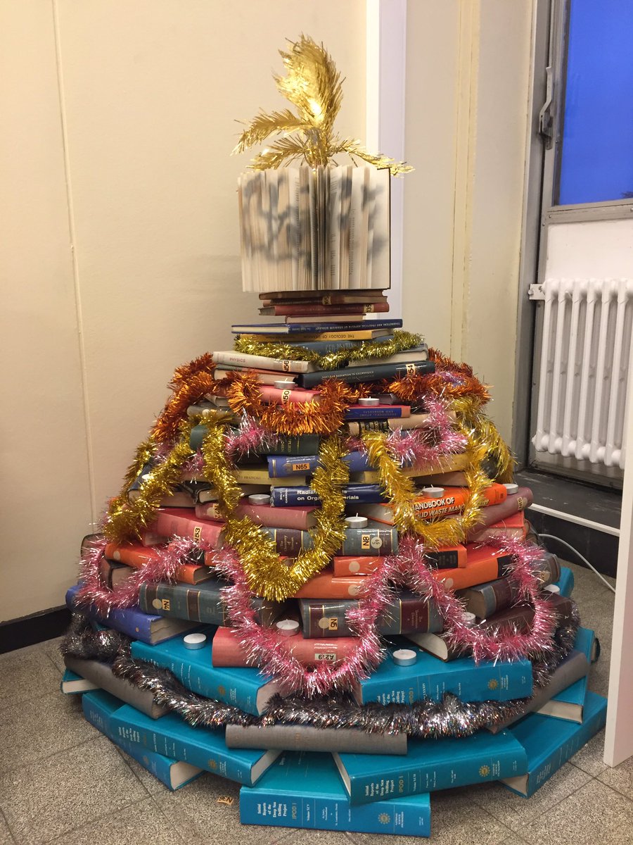 KevinSalesse's tweet photo. Christmas tree made today in my lab during a team building! #Gtime, #CRUMBEL, #FullofScience, #OldGeologyBook, #EcologicalTree, #sustainable https://t.co/ZcEIEteudU