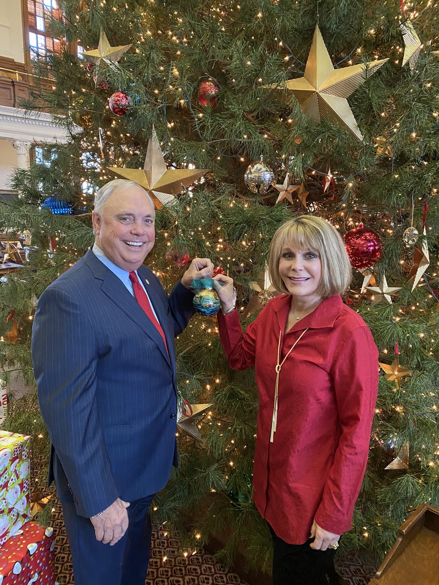 DrewDarbyTX's tweet photo. Today Clarisa & I had the honor of hanging the 2019 House District 72 ornament on the Capitol Christmas tree. Sincere thanks to this year’s artist Thana Cox who painted beautiful water lilies showcasing our area’s international water lilly collection. #District72 #MerryChristmas https://t.co/Hq662gUnJ3