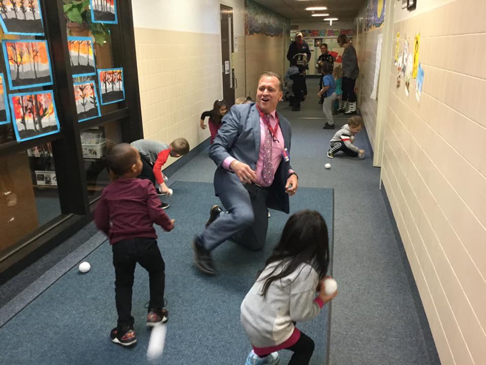 BinghamtonCSD's tweet photo. Our Roosevelt Pre-K students pelted their principal with some indoor snowballs today! THIS is how you build relationships and memories. Way to go, Mr. Chilson! #BPatriotProud https://t.co/VyRvDeHkjk