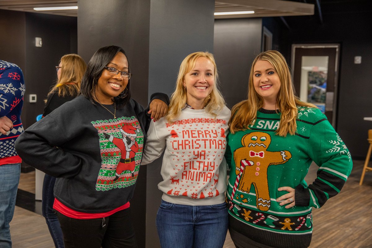 AmericanStrpnt's tweet photo. Tis the season for festive Fridays! Check out some of our Indy staff sporting their best ugly sweaters – which is your favorite? https://t.co/5i2MsH8c6N