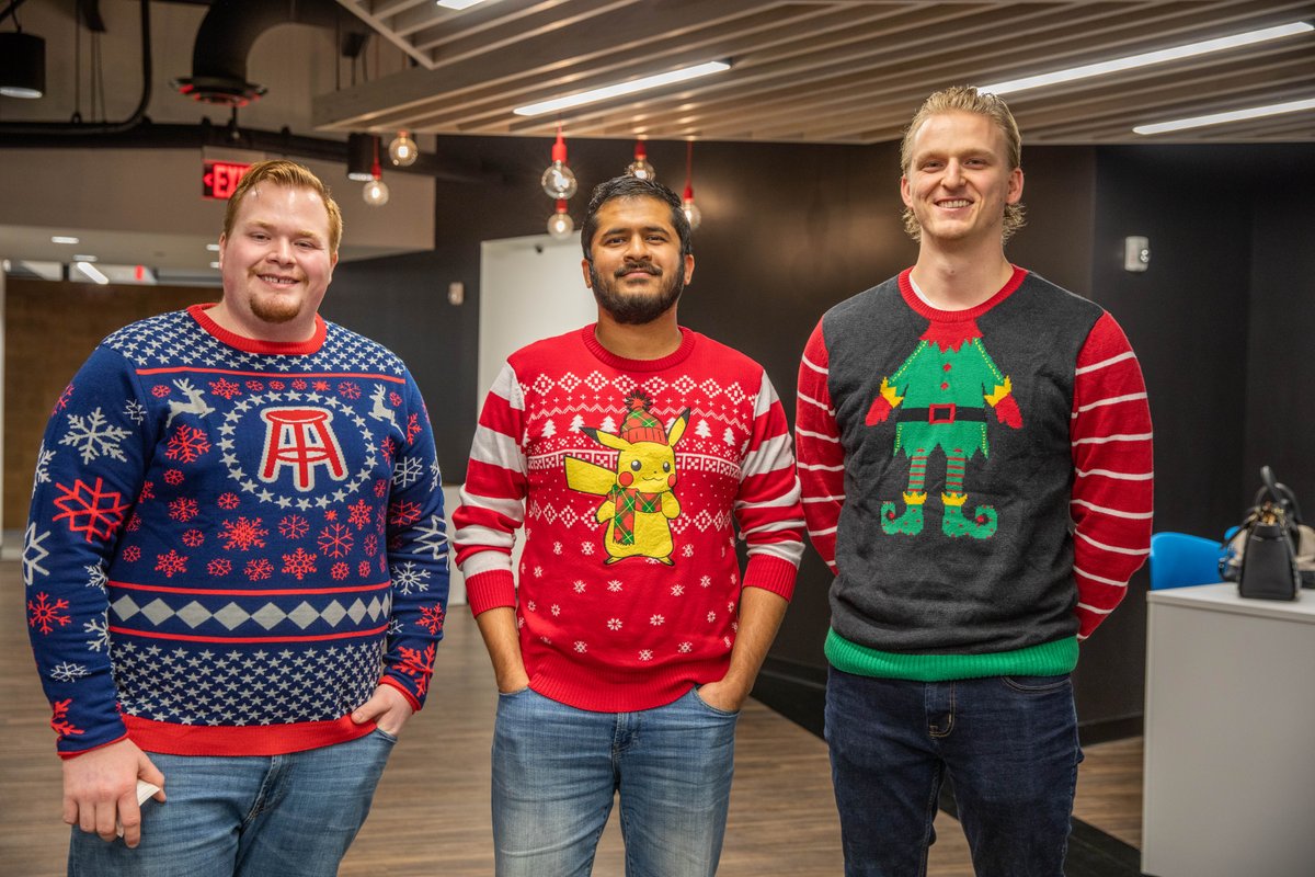AmericanStrpnt's tweet photo. Tis the season for festive Fridays! Check out some of our Indy staff sporting their best ugly sweaters – which is your favorite? https://t.co/5i2MsH8c6N