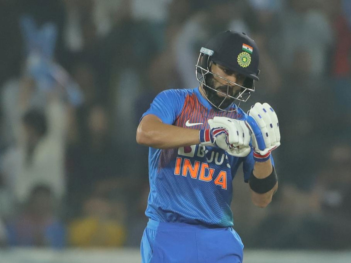timesofindia's tweet photo. #INDvWI #ViratKohli #INDvsWI

@imVkohli's 'notebook' celebration after hitting Kesrick Williams for a six 🏏

WATCH 📽️ https://t.co/8YXP7P0PHh https://t.co/nnmIO2vh9y