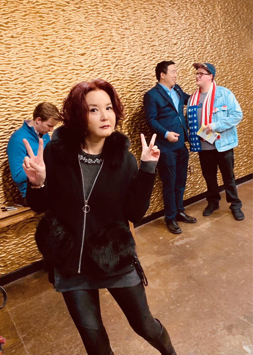 WomenLeisure's tweet photo. So much fun at @DFWforYang meeting AY. Over 1000+ showed up! My two Asian men.😍😍 Photobombed one. His speech was a little different than what I heard before. This room is for high donors. Those of us who paid $1000+ got signed book plus pics with him. #YangGang #YangInDallas https://t.co/TaJfurkOfD