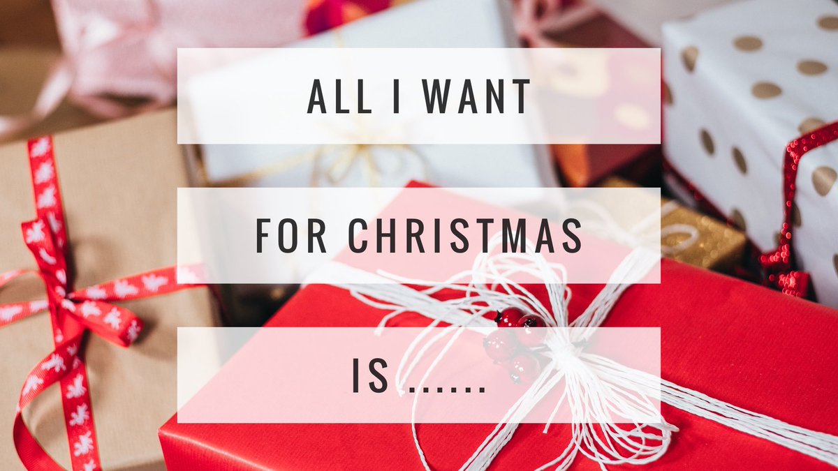 Image shows wrapped presents and the words “All I want for Christmas is ....”