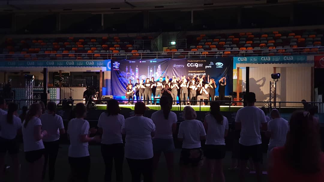 bigsleepoutbne's tweet photo. Thanks to the Absolutely Everybody Brisbane Choir for performing for us tonight at #TheGabba. #endhomelessness #bigsleepout #wbso @BigSleepOuts https://t.co/B0mJ5Uhv5i