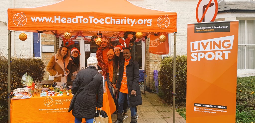Our awesom team of <a href="/CPFT_NHS/">CPFT</a> and <a href="/Lsportevents/">Living Sport Events</a> volunteers looking after the <a href="/head2toecharity/">Head to Toe Charity</a> Christmas shoppers <a href="/MillRoadFair/">Mill Road Winter Fair</a>! If you're in #Cambridge today come and see us (we're here till 5pm)! 🎄🎄🎄