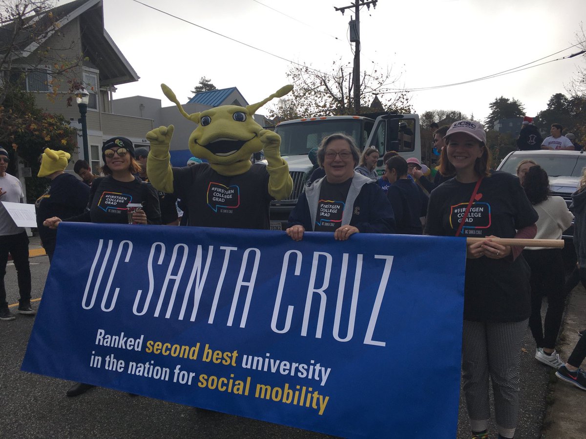 FirstGenUCSC's tweet image. Chancellor Larive joins the first-gen team at the holiday parade downtown!! Way to go UCSC is #2 in social mobility! #ucsc #firstgenucsc