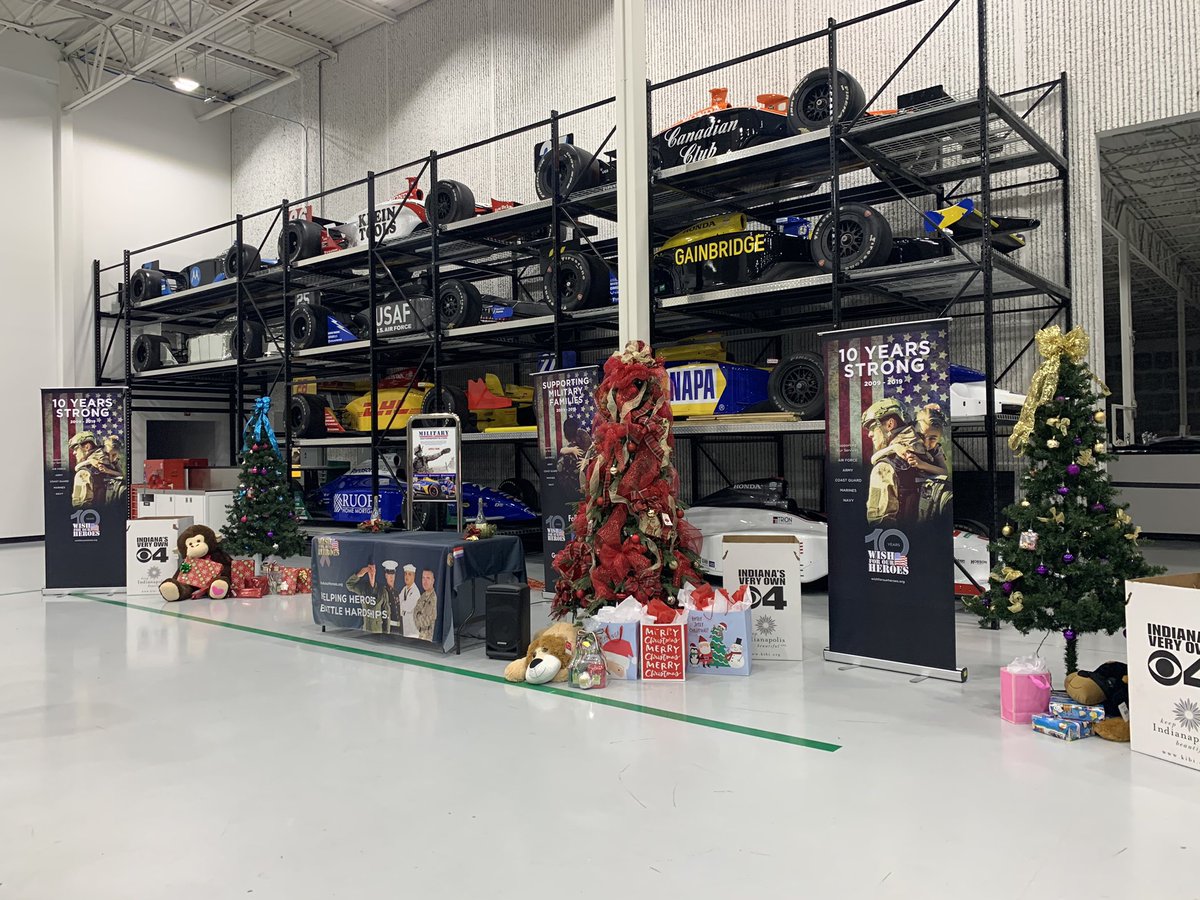 AndrettiIndy's tweet photo. The shop got a holiday makeover today as we help spread holiday cheer! 

Enjoyed spending the morning with Wish For Our Heroes before heading out on Wish Patrol to deliver gifts to military families. https://t.co/WzunS5vri2