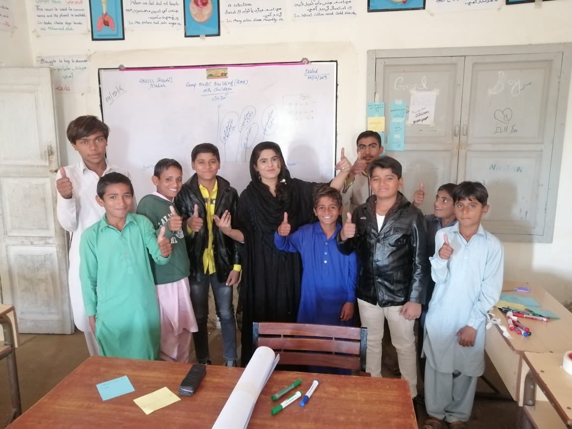 GRID_WashU's tweet photo. #EEQAP Ghotki team is all thumbs up after the great session with students of Sherdil Maher School. The students enjoyed building the connection circle and also identified major areas of concerns for quality education. https://t.co/6zPM2cmUbi