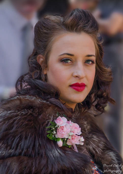 Disc_light's tweet photo. I've always liked this shot. I took it at the Haworth 40s weekend a couple of years ago, I was just standing and watching people go by and this lady just looked at me and so i got the shot. very candid but i like the eye contact. Things I notice as a photographer ! https://t.co/9r9QX6iYQP