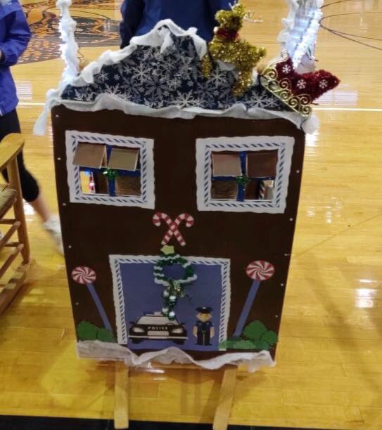 TallyPD's tweet photo. It’s a sweet entry for the Riley House Rock-a-Thon! A gingerbread house police headquarters. It benefits the John G. Riley Museum. It’s at the FAMU-DRS gym. We’re rocking from 10a-3p today. Come see us! #sweetpoliceheadquarters #rockathon #rileyhouse #supportingthecommunity https://t.co/Adi64bNtb8