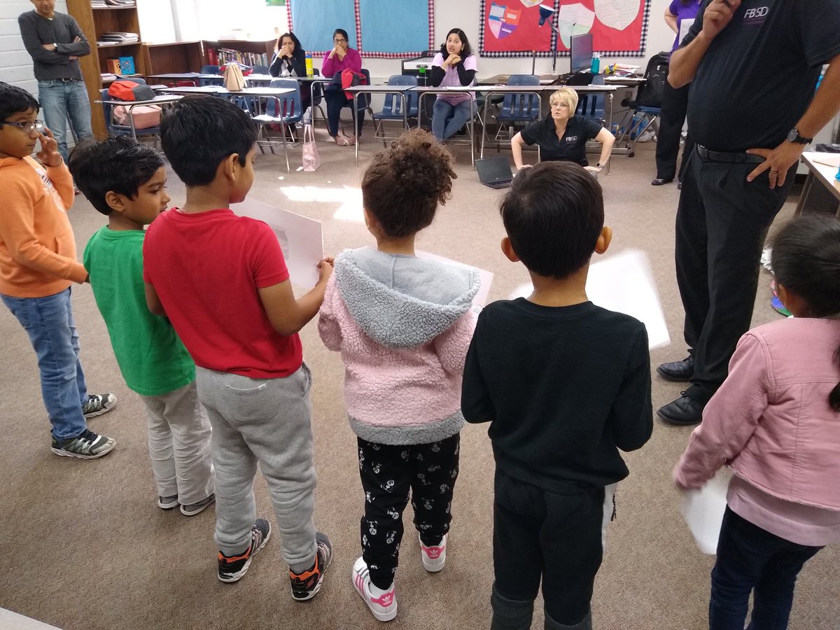 literacytechie's tweet photo. #Fbisdscratchday students and parents learning coding without technology.  Laying the foundation for future coders. @FBISDSTEM #fbisdlearns @scratch https://t.co/VCOTR6VN1x