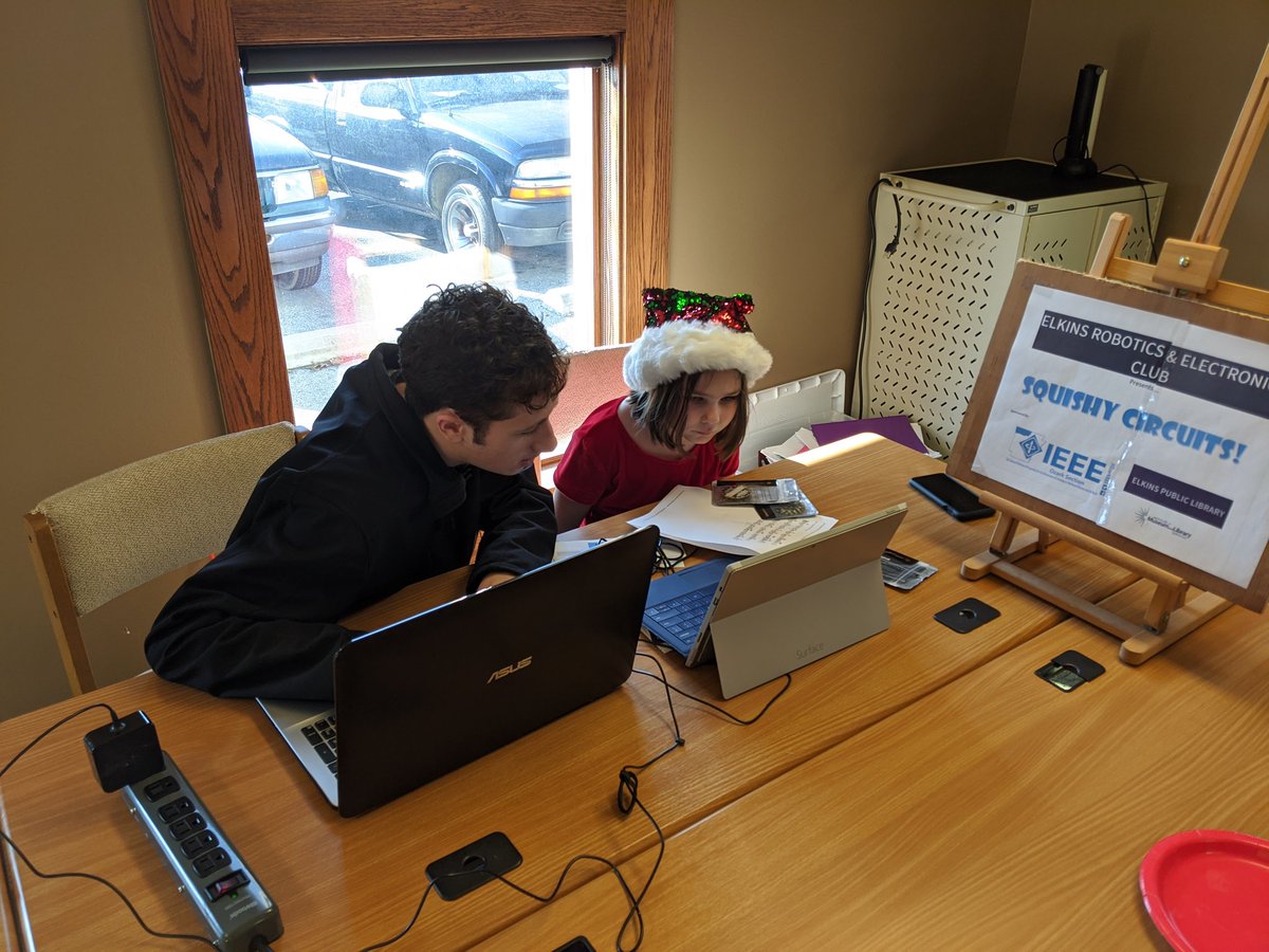 OzarkIEEE's tweet photo. Squishy circuits are go!  Programming jingle bells underway! Having fun with the @ElkinsRobotics club with an open house at the Elkins Public Library! https://t.co/LCtggMhWhc