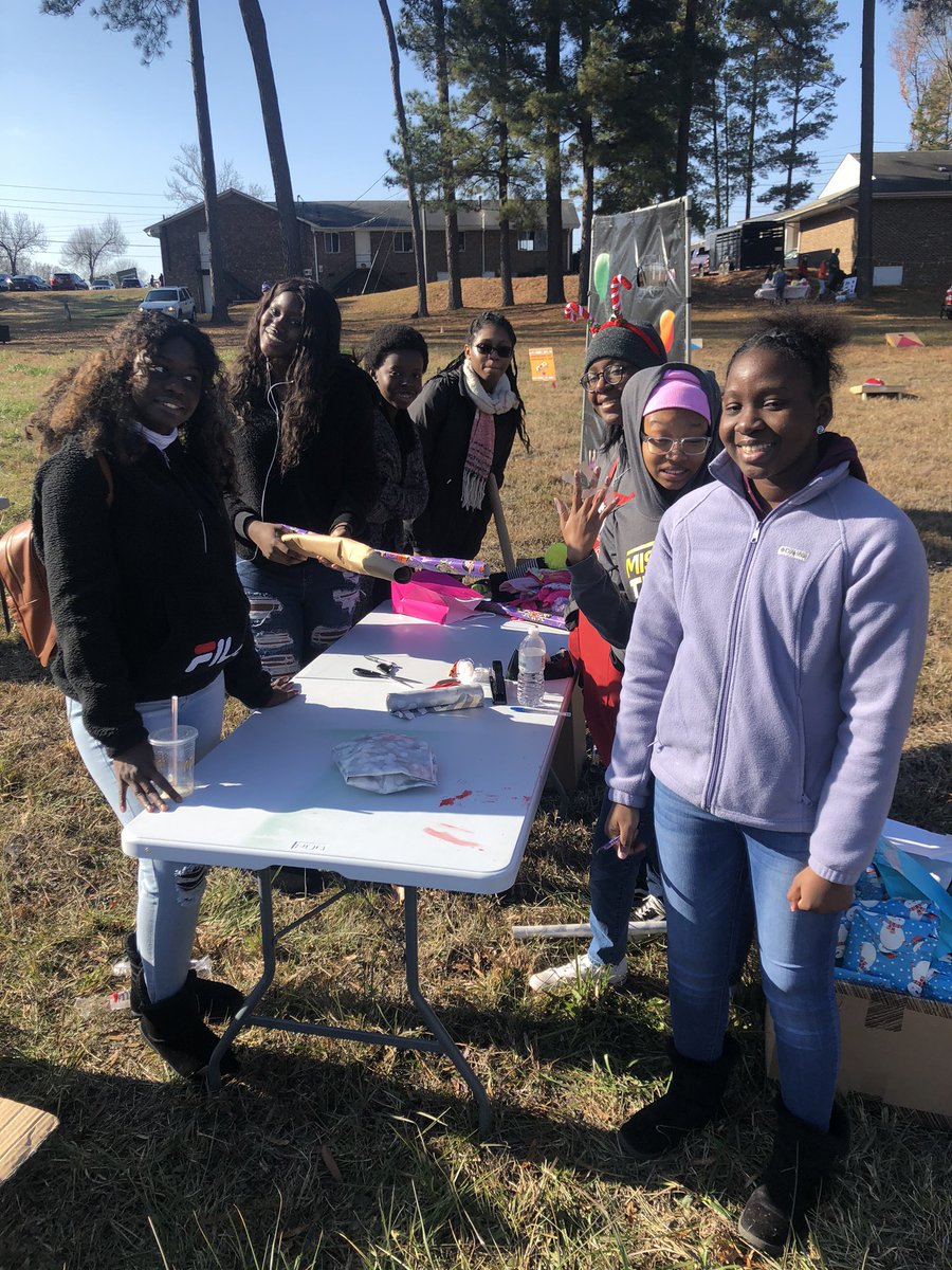 Our StuCo members giving back to the community by wrapping donated gifts!