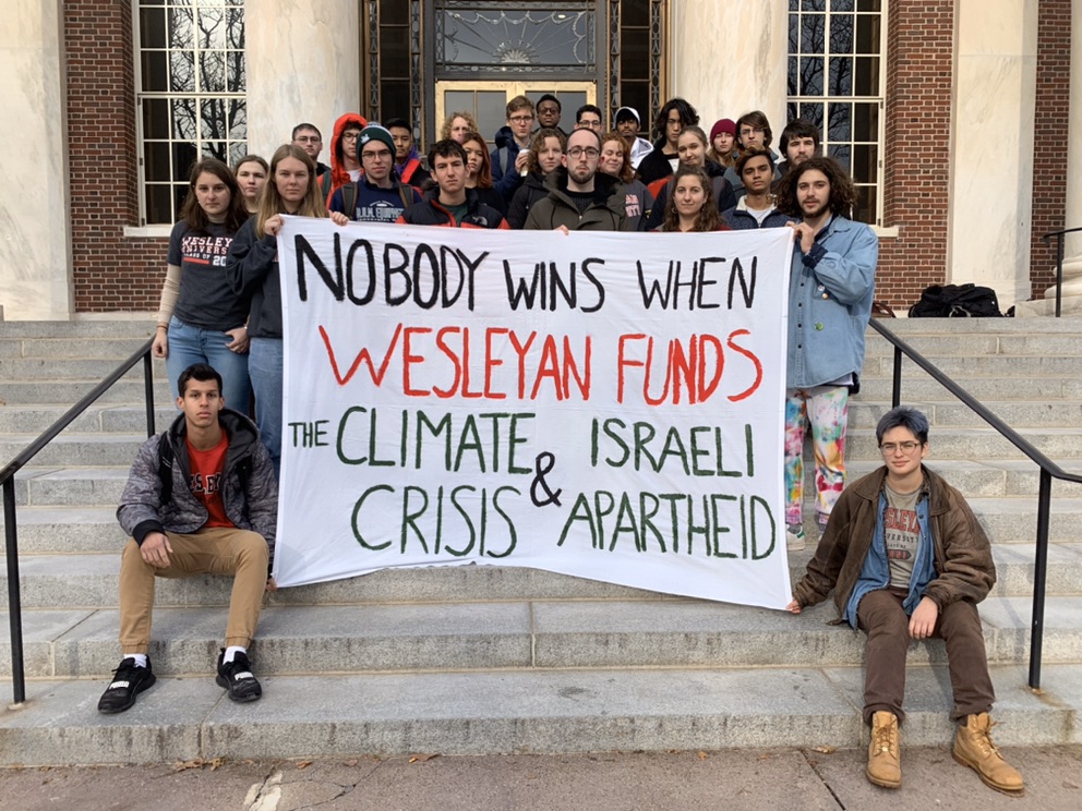 #NobodyWins when <a href="/wesleyan_u/">Wesleyan University</a> funds the climate crisis &amp; Israeli apartheid.

<a href="/mroth78/">Michael S Roth</a> we demand action, meaning real commitments to moving Wesleyan's money.