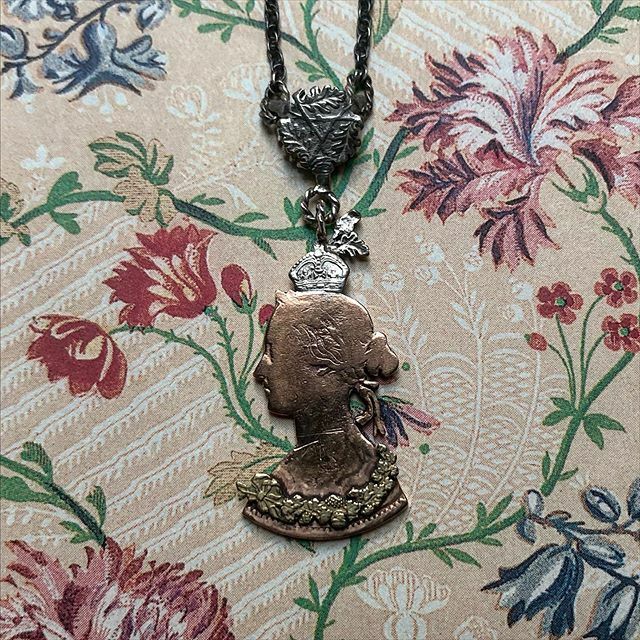 PATCHNYCSHOP's tweet photo. Party Victoria Necklace by @racheleardleysomerset made from an 1874 three pence coin.  Even at 145 years old this Queen is ready for a good time! See more of Rachel’s beautiful jewelry online or in the shop. #patchnyc #racheleardley #queenvictoria #jewel… https://t.co/eplbrU5dM9 https://t.co/B1M8QpMWPf
