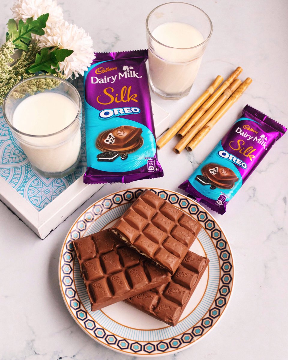 Why only eat cookies &amp; milk when you can eat a chocolate bar filled with cookies paired with milk🙊 The @cadburydairymilksilk Oreo is a blend of silky smooth chocolate with a crunch of Oreo cookies, the perfect combination with a cold glass of milk! #HowDoYouSilk #HDYS