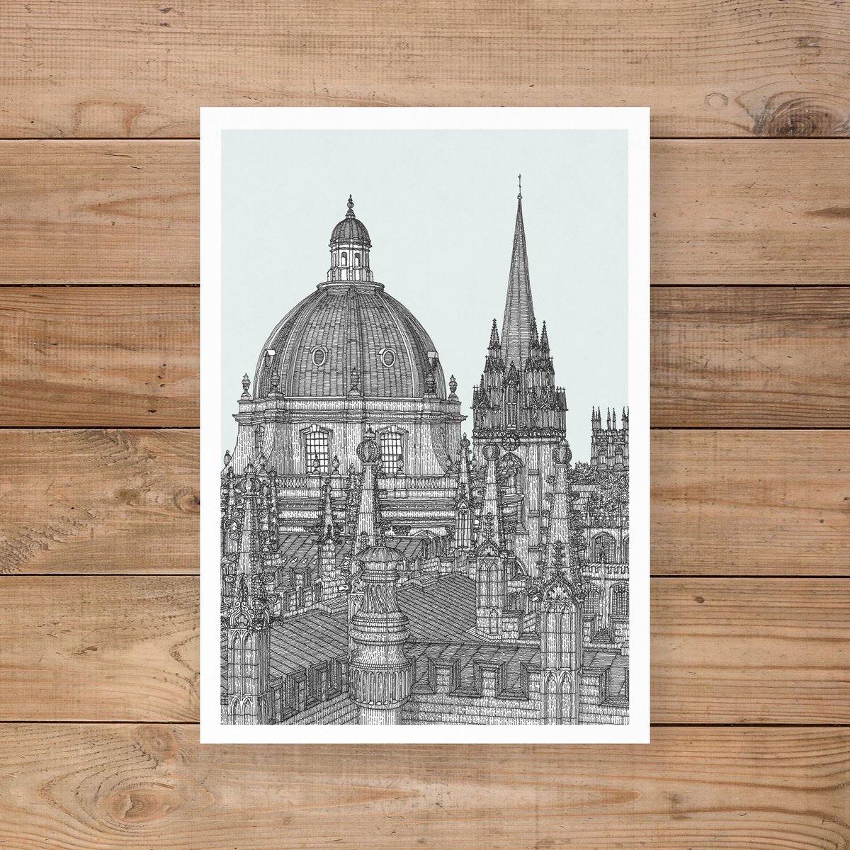 Mr_MichaelLewis's tweet image. The #SpiresOfOxford Limited Edition Print. Inspired by the poem by Winifred M. Letts, the unique hand drawn perspective captures a roof top view from the Sheldonian Theatre towards the Radcliffe Camera in Oxford. #Drawing #Architecture #Oxford