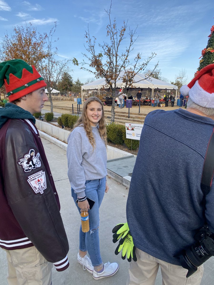 Drain68's tweet photo. HHS Interact Club members volunteering at the Lewisville Rotary/Salvation Army Breakfast with Santa in downtown Lewisville Saturday @Hebron_HS @HebronSoftball https://t.co/TLbPZpweRF