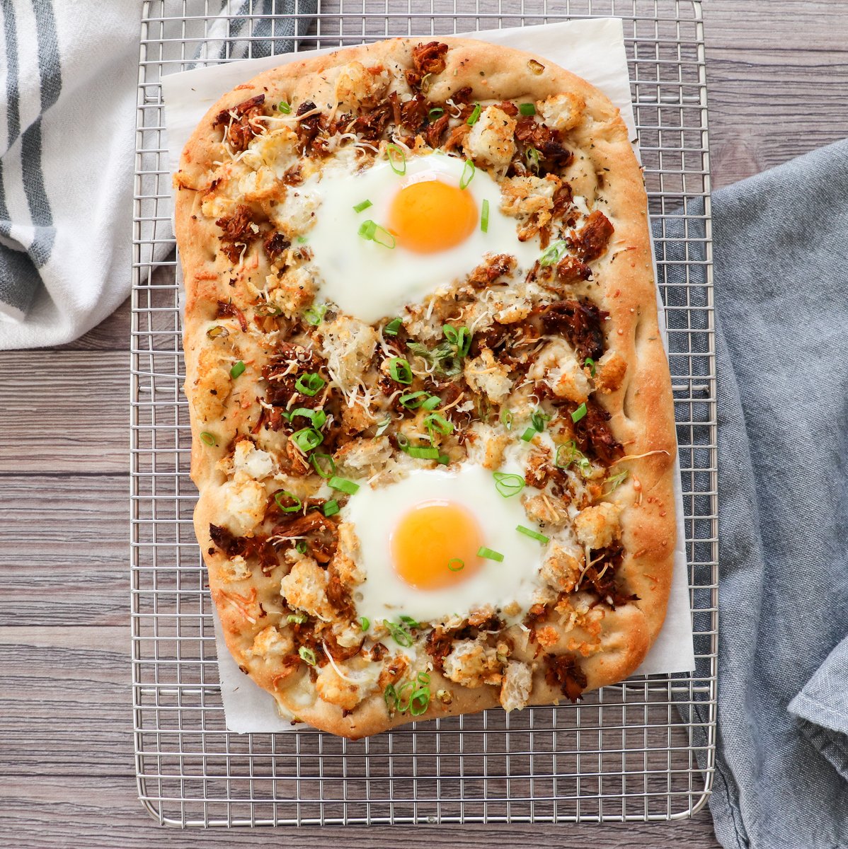 Breakfast flatbread this morning! Wanted to use up some leftovers so homemade dough, pulled pork, hashbrowns, cheese, green onion and eggs. 

What're you having? 

#breakfast #food #foodies