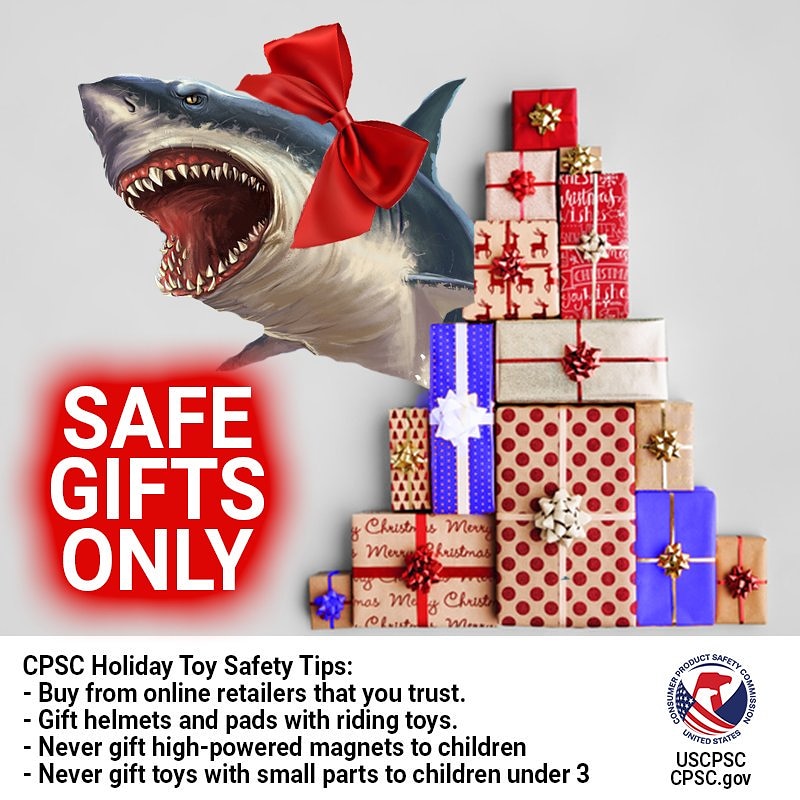 A shark jumping out from behind a pile of presents. The text reads: safe gifts only. Buy from online retailers that you trust. Gift helmets and pads with riding toys. Never gift high-powered magnets to children. Never gift toys with small parts to children under 3.