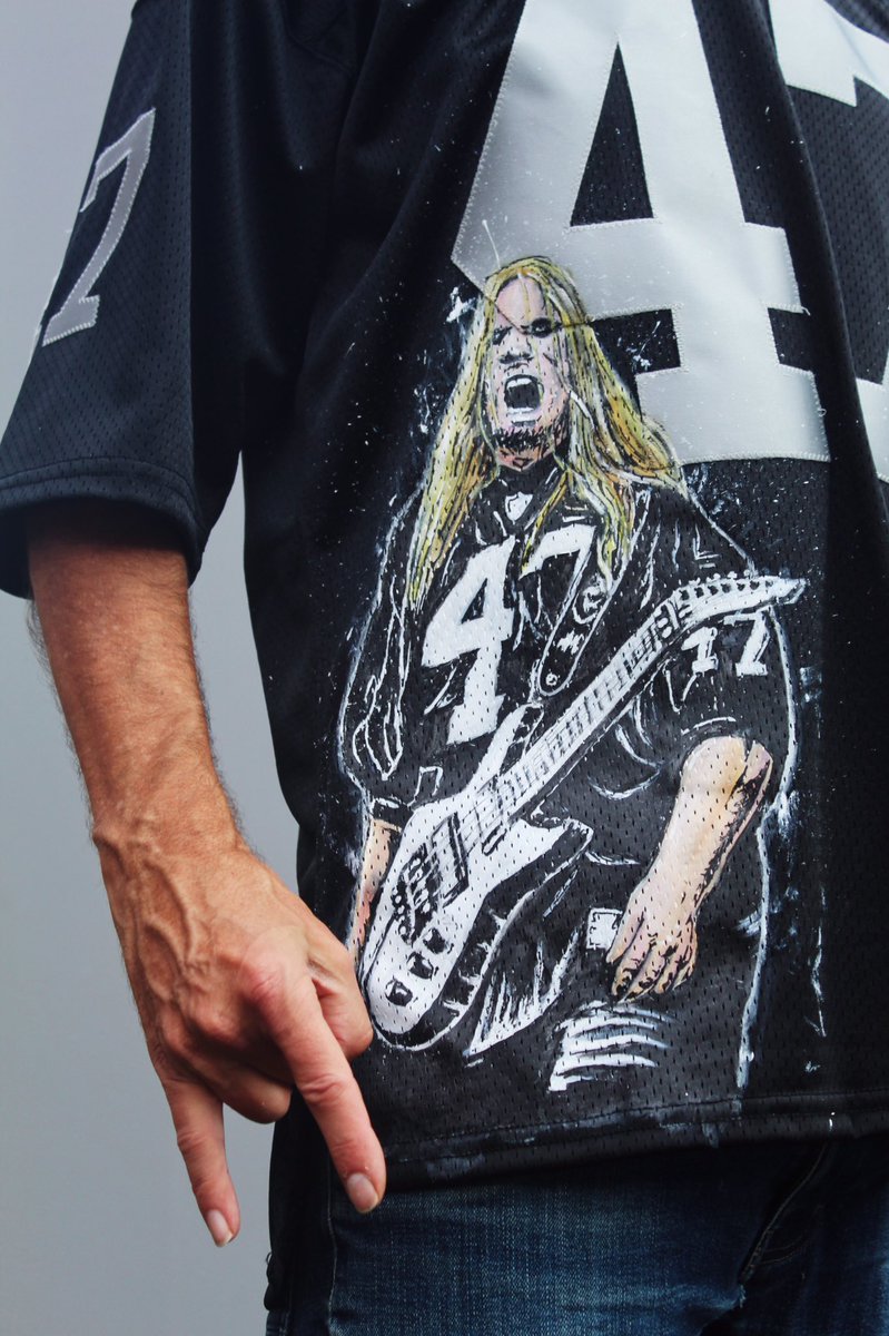devocustoms's tweet photo. ‘Jeff Hanneman’ custom @Raiders jersey for my old track coach RC! 

When Rob saw @Slayer was coming to Portland he had to get tix. 

I customized this jersey to pay homage to lead guitarist Jeff Hanneman and Rob showed up in style! 😎

#devocustoms 
@PortlandPilotXC https://t.co/qu3RI6ZpWC