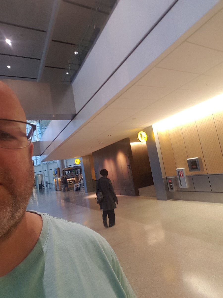 BrianHaskinsPhd's tweet photo. Looks like @SeaTacAirport has defibs every 100 m, first selfie with 2 defibs. Makes finding a defib easy and ensures no delay to public access Defbrillation. #aedinthewild #citizencprf @CASSummit @PEC_ANZ @VACAR_AV @CAARestartHeart https://t.co/kW22wDbSnZ