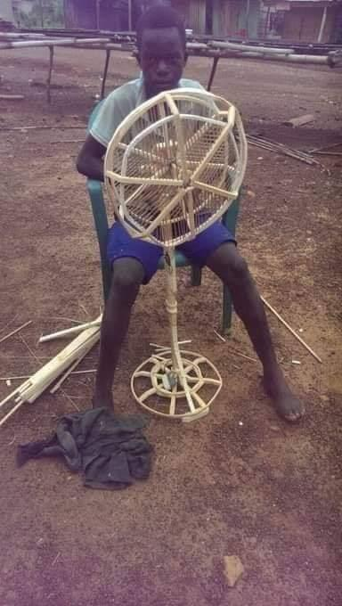 Ga_sasira's tweet photo. This 15-year-old boy makes wooden standing fans all by himself in the space of 2 days. 

Can we retweet and get this potential engineer some recognition.
#ruralscience 
#africangiant https://t.co/DhllRoYP85
