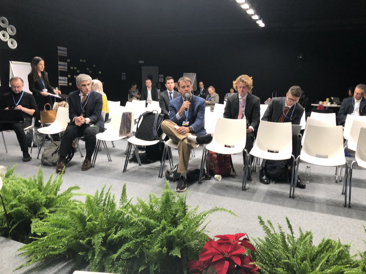 Cop26_VT's tweet photo. John McGee, Ryan Mahoney, and Owen Callahan participating in a capacity building event on forests at the Climate Change Conference in Madrid.@vt_cnre @VTFREC https://t.co/SX7YufcvCy