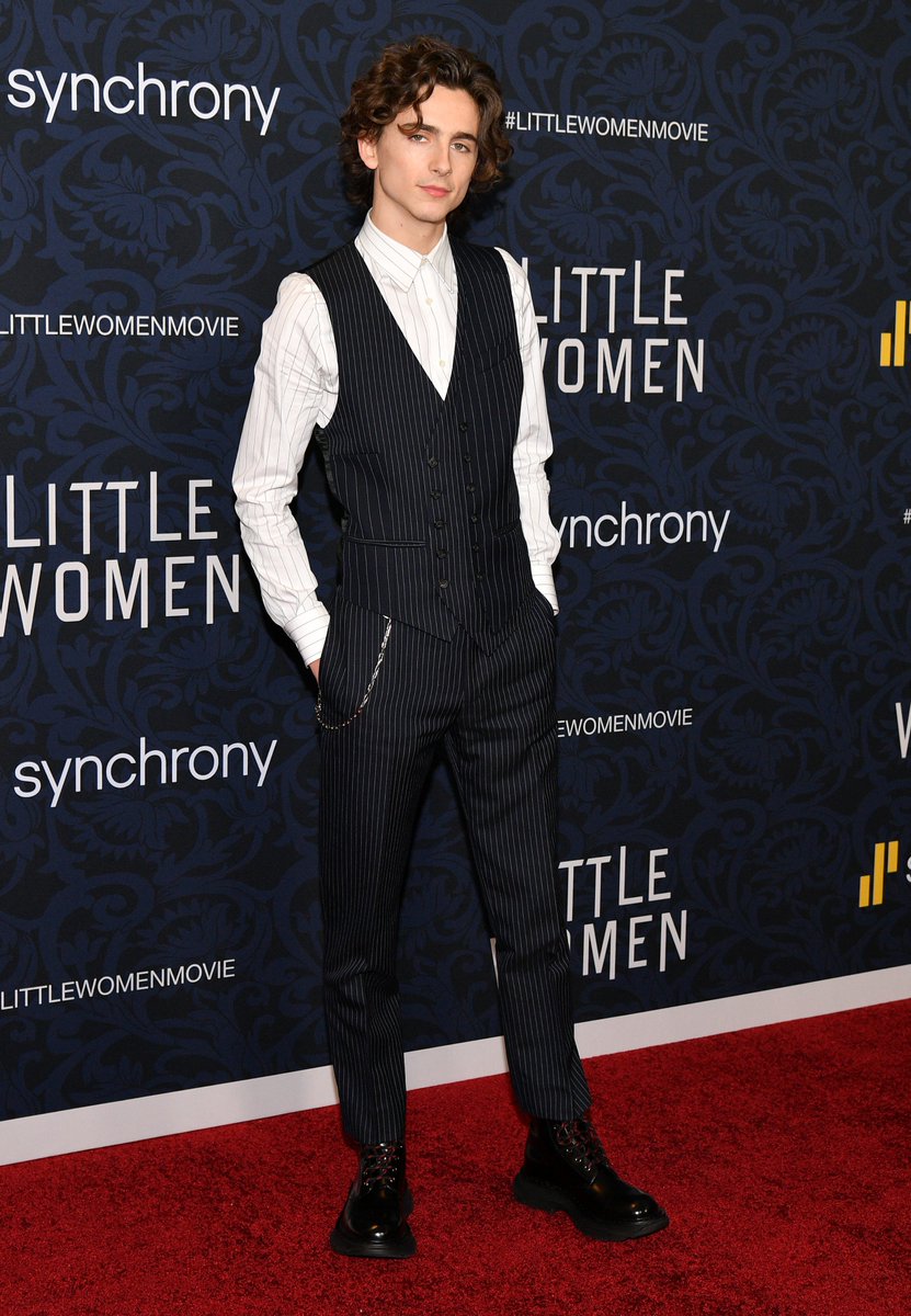 McQueen's tweet photo. @RealChalamet wears an Alexander McQueen reconstructed waistcoat in pieced and patched pinstripe, narrow pinstripe trousers and a classic striped cotton poplin shirt with Tread boots to the world premiere of Little Women.

#TimotheeChalamet
#SeenInMcQueen
#AlexanderMcQueen https://t.co/yGIsM7wnPP