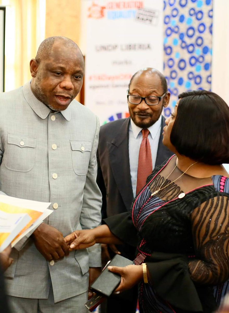kaniog's tweet photo. The Minister of Finance of the Republic of Liberia Hon. Samuel Tweah greets the Vice President Madam Jewel Howard-Taylor during the @UNDPLiberia HDR Launch while UNRC Kingsley Amaning looks on. @UNDP @UN_Liberia #HDR2019 @UNDPAfrica https://t.co/uhndaVjxrb