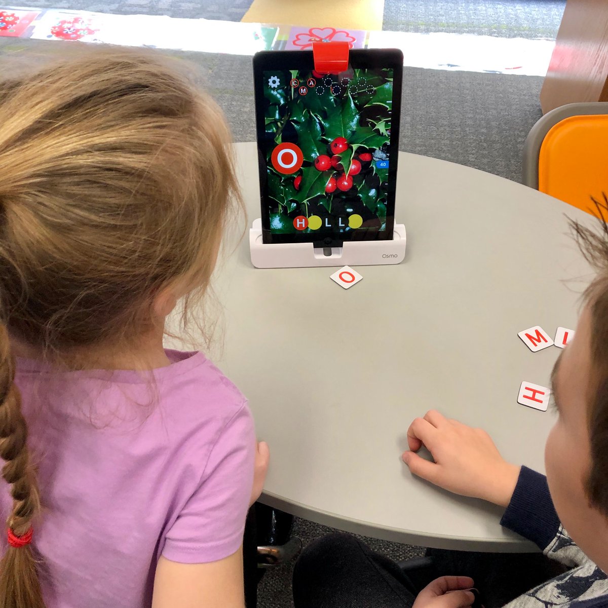 MediaRHPS's tweet photo. Increasing our vocabulary, poinsettia, holly, St. Nicholas with 
@PlayOsmo. I usually sing a carol with the word in it to give them a clue, poor kids, I can’t carry 🎙 a tune! #RHPSistheBEST #JollyOldStNicholas #HaveAHollyJollyChristmas https://t.co/BpLQGvp53V