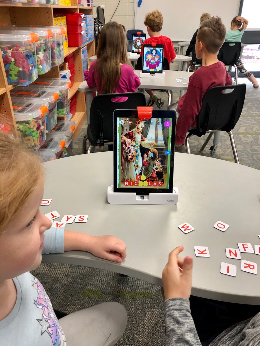 MediaRHPS's tweet photo. Increasing our vocabulary, poinsettia, holly, St. Nicholas with 
@PlayOsmo. I usually sing a carol with the word in it to give them a clue, poor kids, I can’t carry 🎙 a tune! #RHPSistheBEST #JollyOldStNicholas #HaveAHollyJollyChristmas https://t.co/BpLQGvp53V