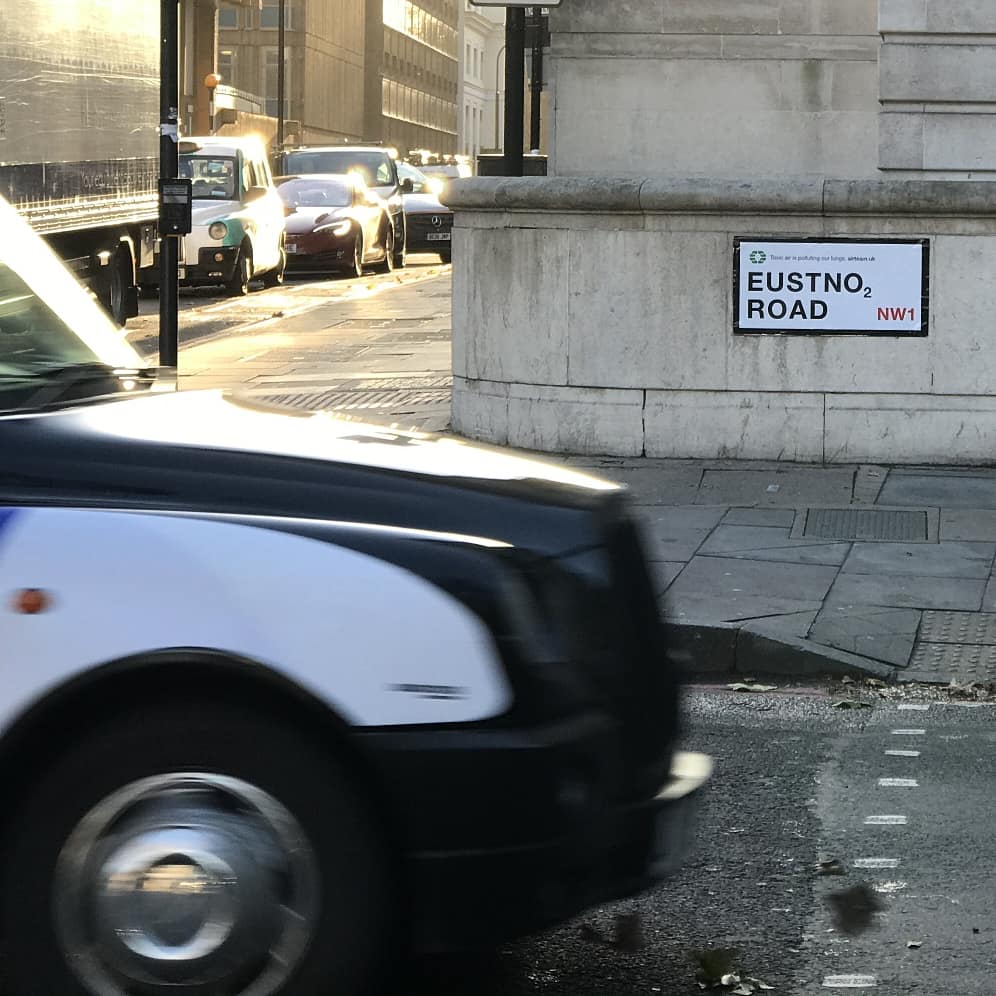AirTeamUK's tweet photo. While @XRLondon raised awareness of our #AirPollution crisis in Leicester Square - we showed our support with another street sign takeover in Euston. Toxic air is polluting our lungs! https://t.co/LvMKrMKPCv