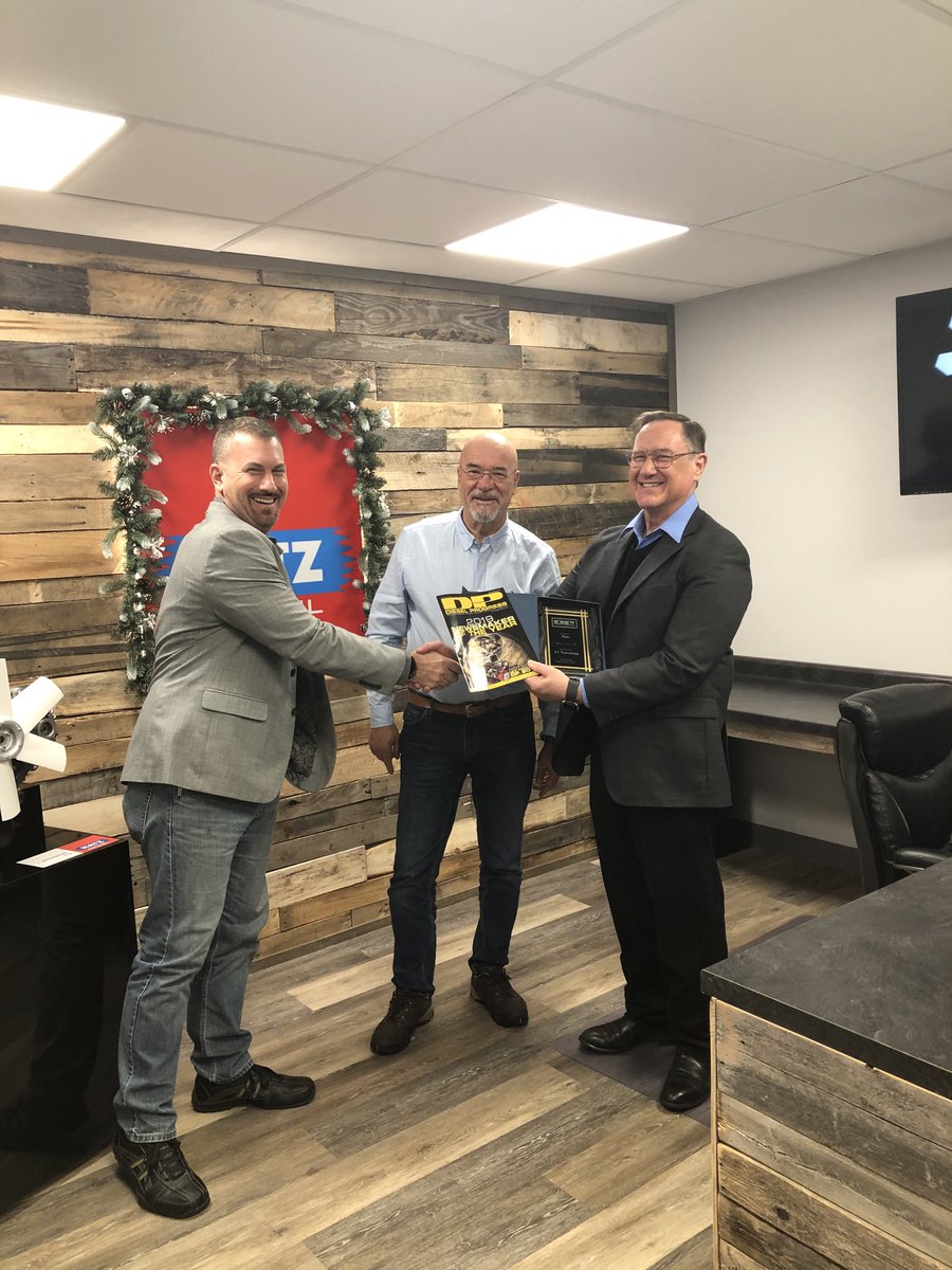 ⁦<a href="/HatzDiesel/">Motorenfabrik Hatz</a>⁩ Mike Hartoonian and Wolfram Hatz receive their 2019 Notable New Product Award from DP’s Mike Brezonick.