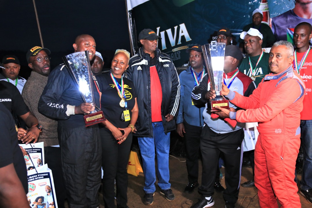 IngoMagazine's tweet photo. In the two-wheel drive category, the #AUTOPAINTS-#SAVONOR #RallyTeam Mwananteba Zamim/Maceri Dias won the 1st place and were awarded 🏆 by Mayor of @NgoziProvince city Mr. Songambele Radjabu with Lady @hedgal, @fia delegate at Rally of Ngozi in #Burundi.
#Ingomag #NgoziAt100 https://t.co/L2MV8keNfh