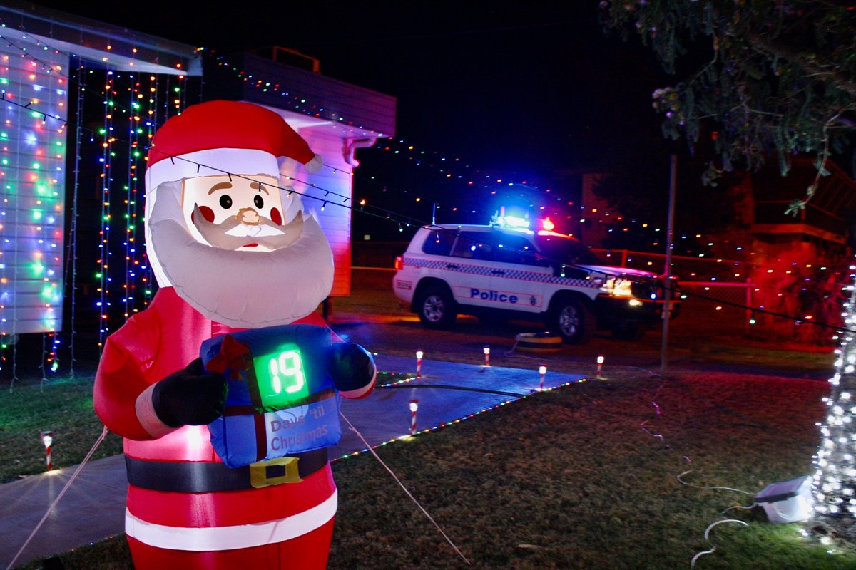 QldPolice's tweet image. Boulia officers have been busy getting ready for Santa’s arrival. The station display includes inflatable Santa's, over 650m of lights, projectors and QPS themed Christmas trees. Thanks for spreading the Christmas cheer Boulia! 🎄🎄More here: mypolice.page.link/Kewd #myPolice