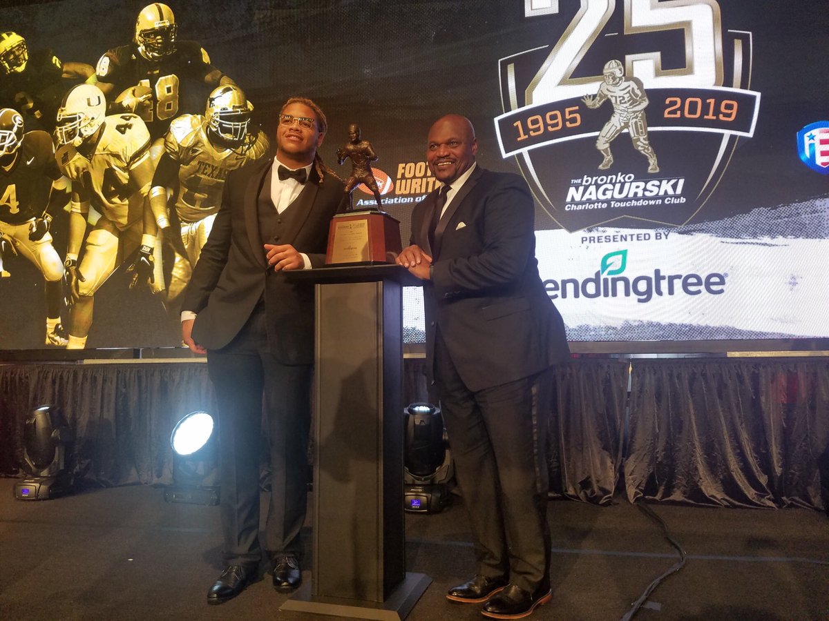 OhioStateFB's tweet photo. Buckeyes everywhere in Charlotte tonight to celebrate @youngchase907 winning the @NagurskiTrophy 🏆 https://t.co/GI6kt9S3WV