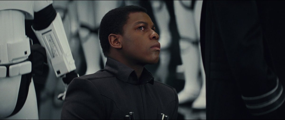 In The Last Jedi, directed by Rian Johnson, Finn was slapped while on his knees by the leader of the order that kidnapped him as a child and forced him to be a child soldier.