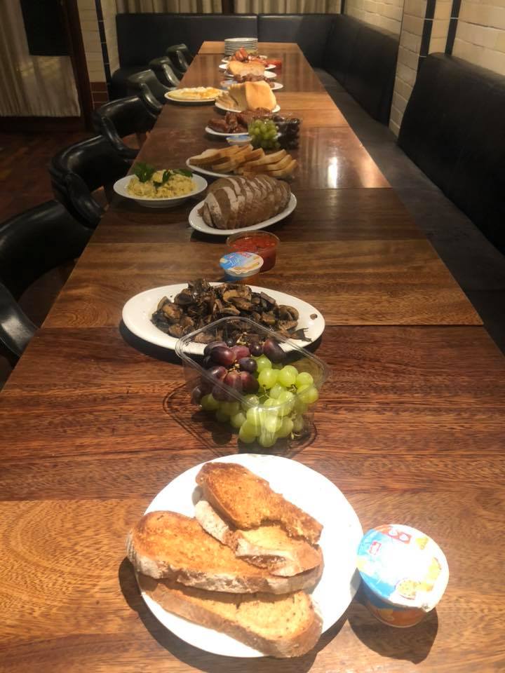 HawksmoorGroup's tweet photo. When Macron &amp; Merkel are in charge of Sunday staff breakfast...Bacon, sausages, toast, gluten-free bread, fried eggs, scrambled eggs, mushrooms, tomato salsa, guacamole, grapes and yoghurt…This is how we roll in #HawksmoorBorough Great work guys! #WorkSomewhereAwesome https://t.co/UQw4ckbQ7J
