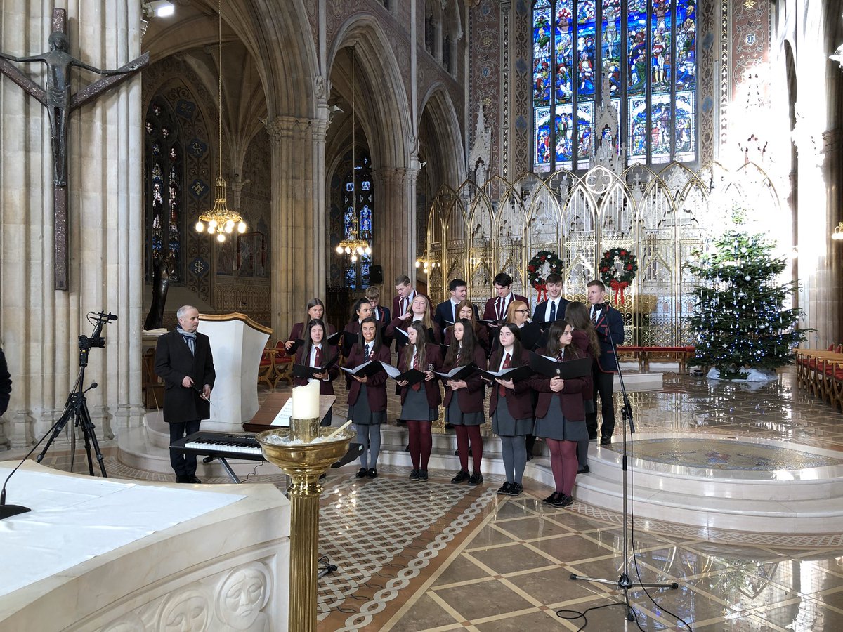 Music_StPauls's tweet photo. Some of our senior girls’ choir members with the tenors and basses from Royal School, Armagh recording music for the Archbishops’ of Armagh’s Christmas message for RTÉ TV. Will be broadcast on Christmas Day around 12 noon. https://t.co/3YhmS3PxLf