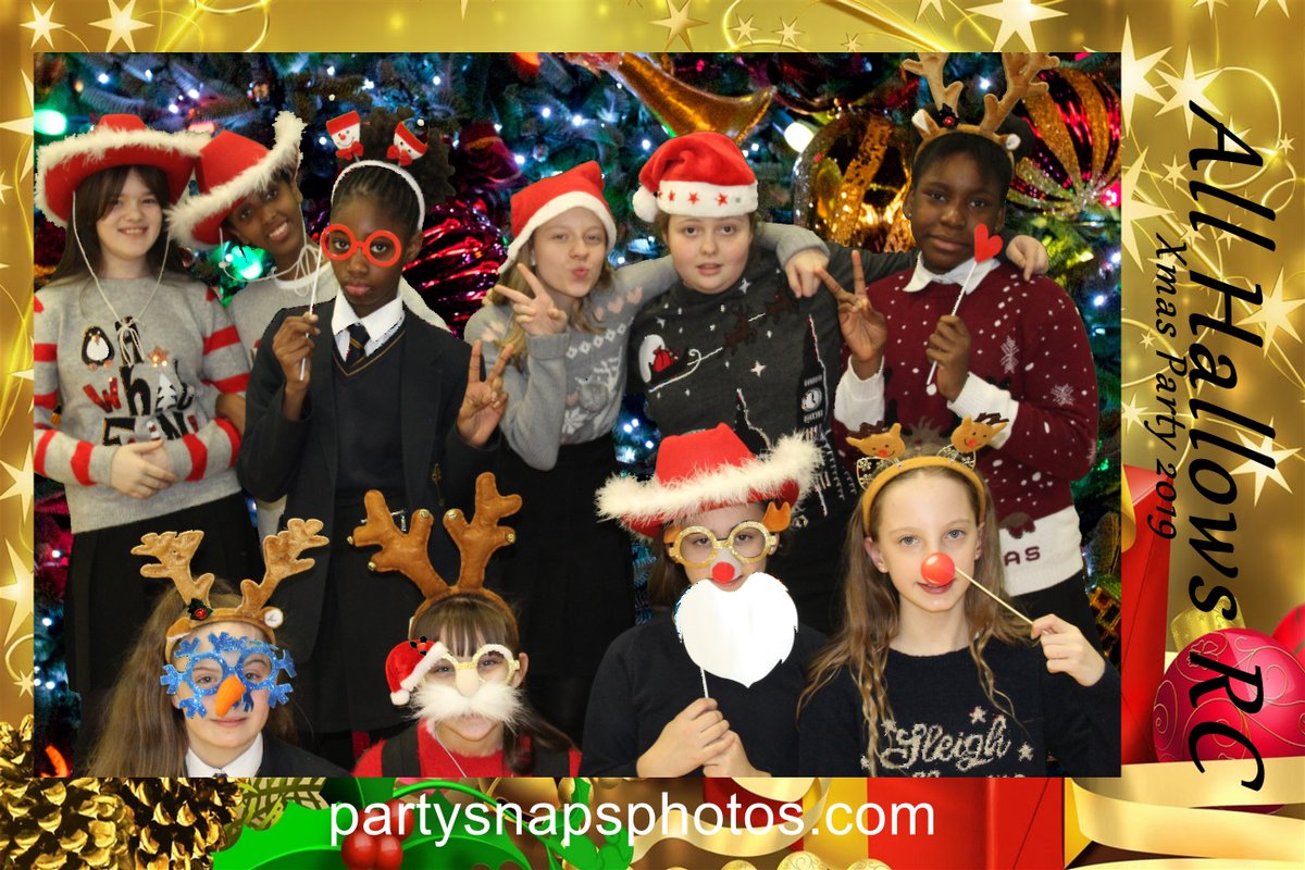 AllHallowsRC's tweet photo. Lots of Christmas fun happening in school today: 
Christmas jumper day, the 'Elfie' photo booth, Light Fever with @FatherFrankie &amp; the second ice skating trip of the week! A huge thank you to Pam &amp; our wonderful canteen staff for today's delicious Christmas dinner too! #Christmas https://t.co/ScRVwj6u3V