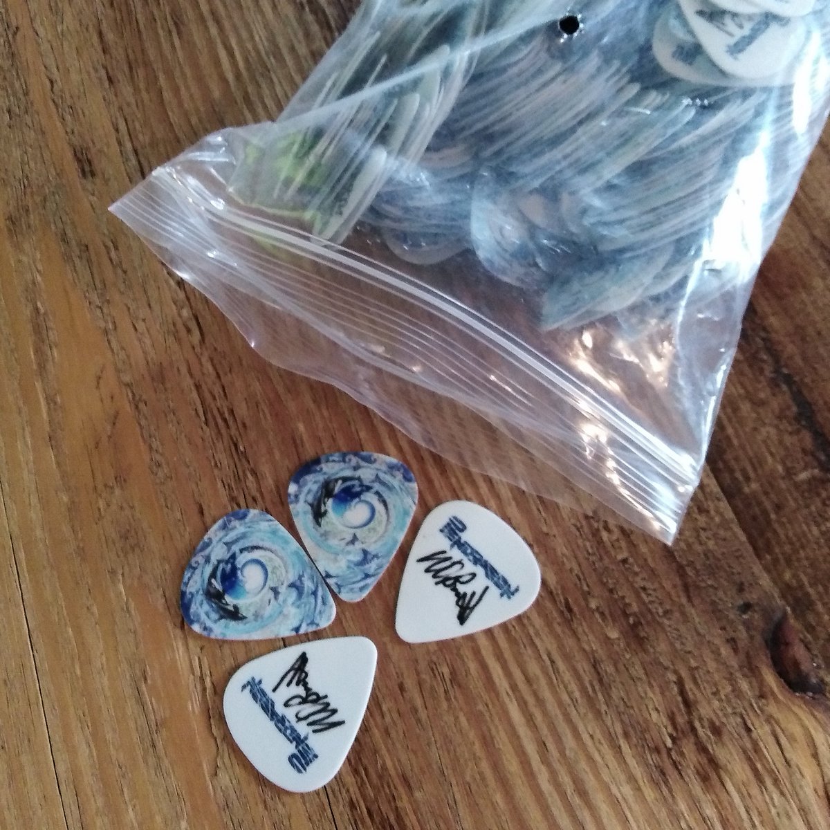 Big thanks to <a href="/PickWorld/">PickWorld</a> for another bunch of stunning picks!  This time we've printed on delrin (which is just like Tortex yellow) so they'll not slip in even the hottest guitarist's hands! 😋🐳🌊🐳🐳🌊 #pendragonloveoverfear