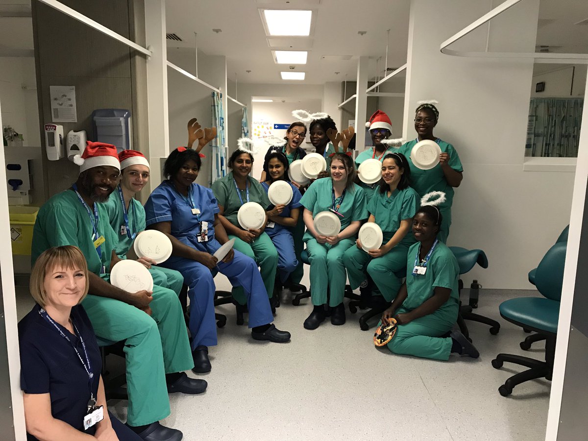 Team recovery enjoying alittle festive fun team building 😊drawing Xmas scenes on top of their heads!