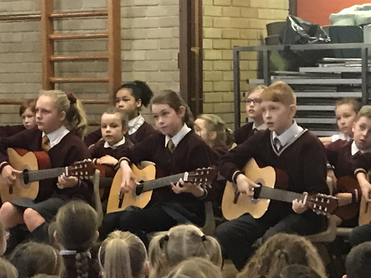 stedwardsrc's tweet image. Another wonderful Christmas guitar assembly. Our wonderful musicians, led by Mr Hemingway, filling us with Christmas spirit #LoveLearnSmileBelieve