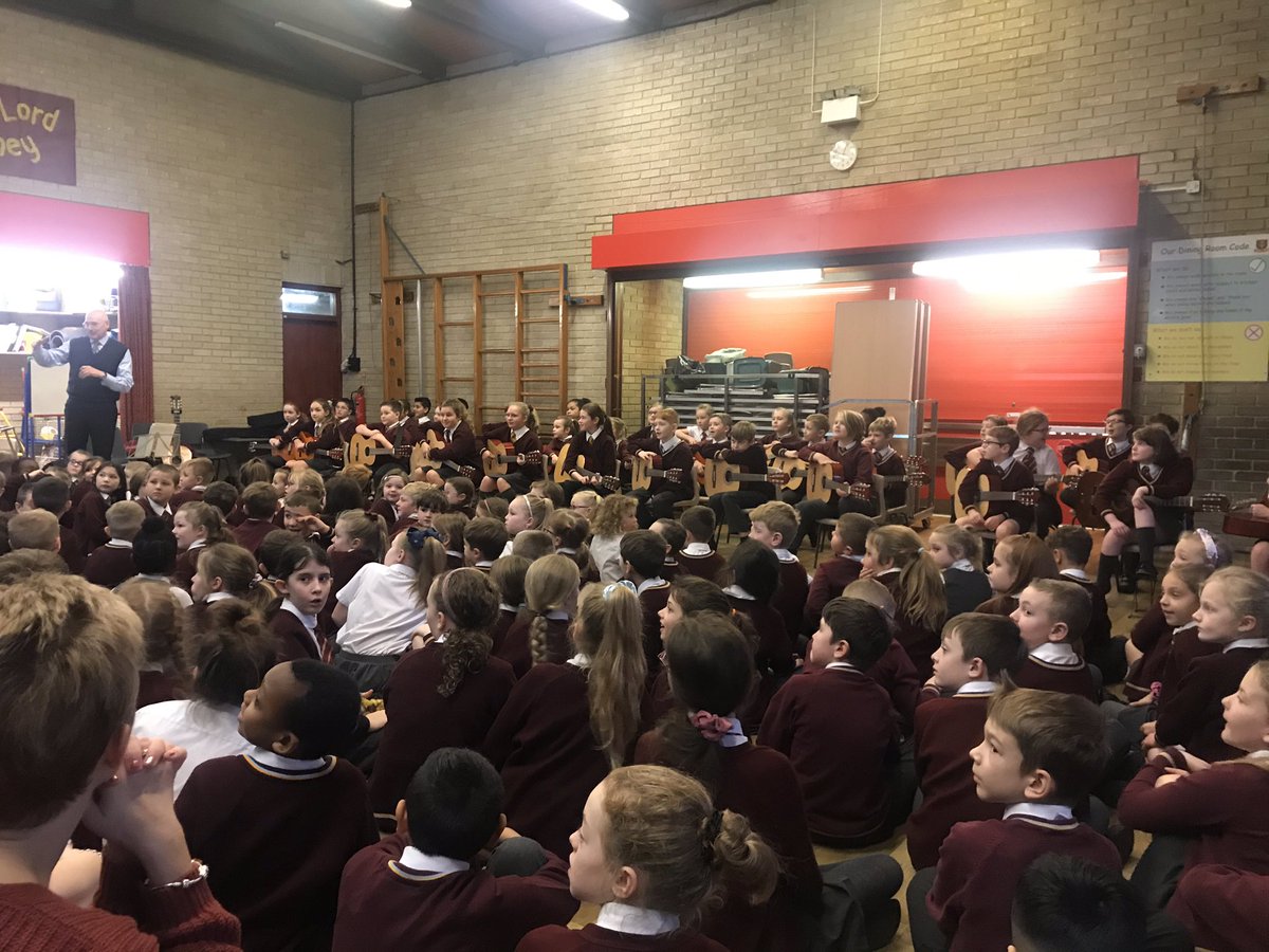 stedwardsrc's tweet image. Another wonderful Christmas guitar assembly. Our wonderful musicians, led by Mr Hemingway, filling us with Christmas spirit #LoveLearnSmileBelieve