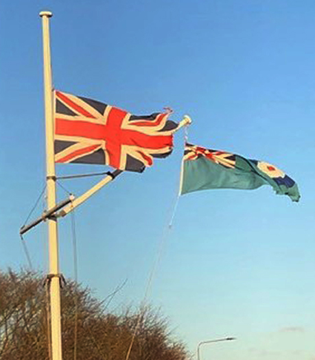 eppingforestdc's tweet photo. Flags are at half mast at North Weald Airfield in memory of Battle of Britain pilot Flt Lt Maurice Mounsdon who died at 101. He flew with 56 Squadron from the airfield during WWII. 56 Squadron was awarded Freedom of Epping Forest District in respect of their courage in action. https://t.co/f5QQKFpGlV