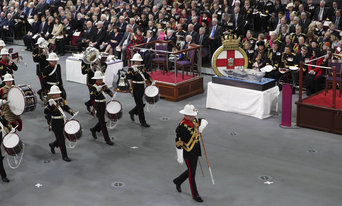 RoyalNavy's tweet photo. .@RMBandService leads the celebration for @HMSPWLS's commissioning ceremony. @HMNBPortsmouth #HMSPrinceofWales #CarrierTakeTwo https://t.co/s4AB32GpIS
