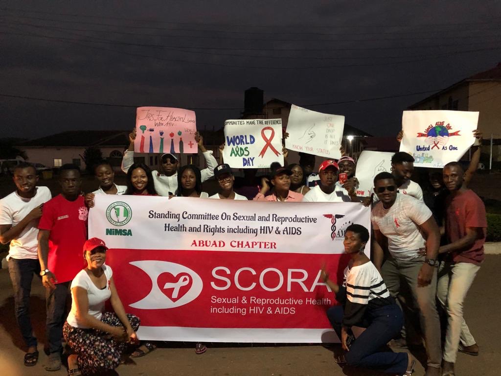 ZaddyAbdul's tweet photo. So over the weekend, NiMSA SCORA, ABUAD Chapter organised a WALK FOR AIDS, an awareness walk on HIV &amp; AIDS to commemorate the World AIDS Day. We started from Federal Teaching Hospital, Ido-Ekiti and walked through the streets of Ido community sharing the word on HIV &amp; AIDS https://t.co/hUpv5Tvnar